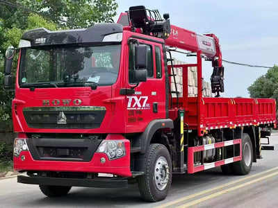 Howo MAN-engine 290 model equipped with a Changxing 10-ton, 5-section boom crane